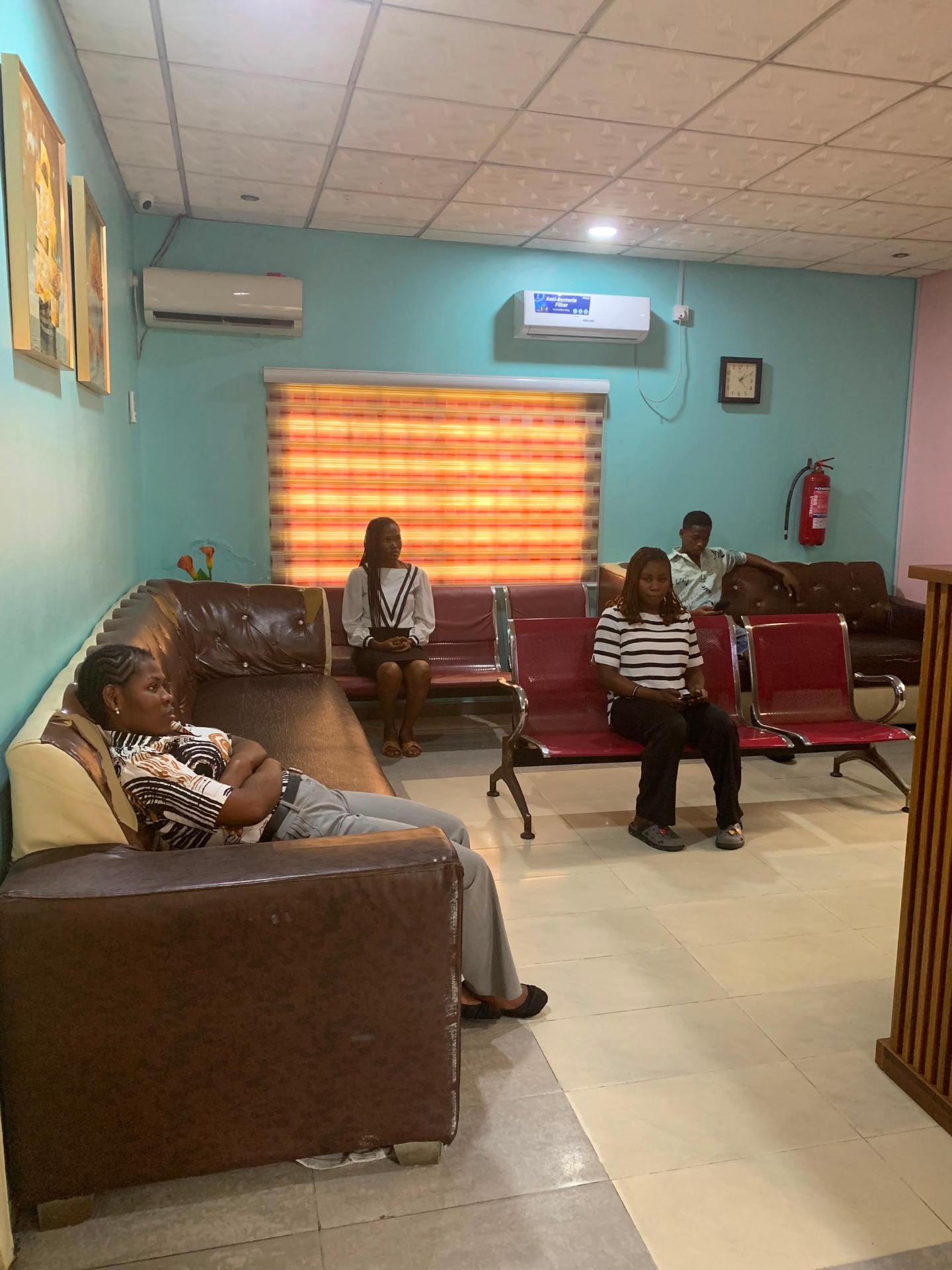 Patients seated in the reception and waiting area at Prestige Specialist Hospital